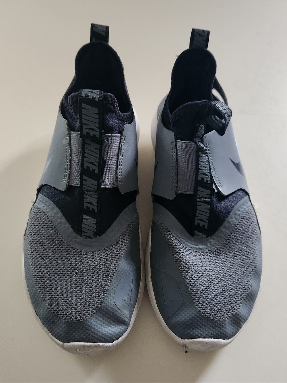 Nike Men’s Slip-On Sneakers in Gray and Black